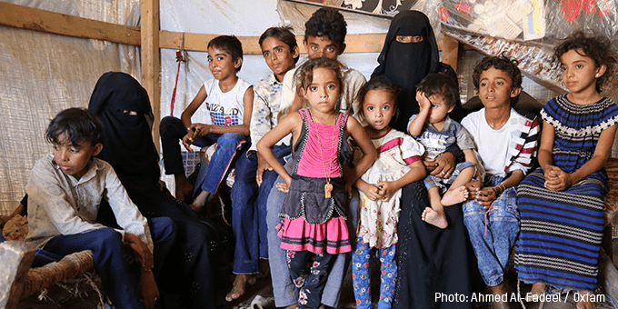 Hind Ahmed with her ten children in their temporary tent, Bani Thawab sub-district
