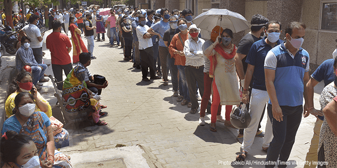 People standing in line for vaccine