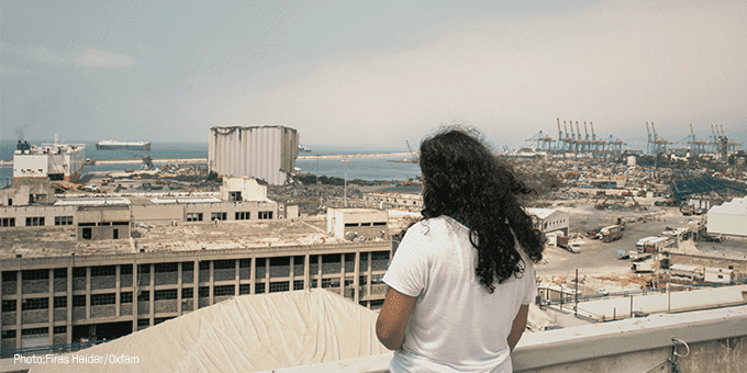 Woman looking at buidlings