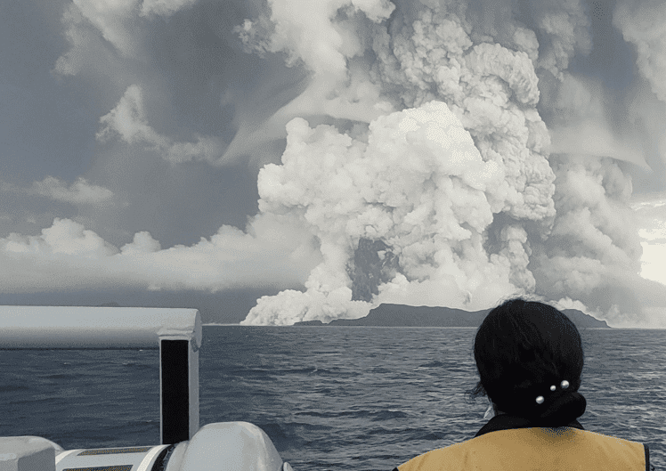 Image of a large volcanic eruption at sea