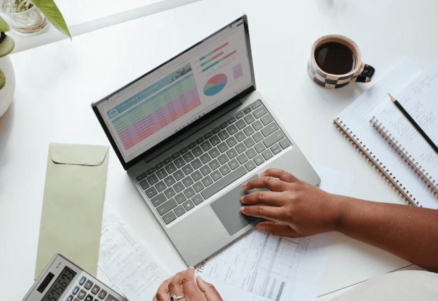 A woman working on a laptop