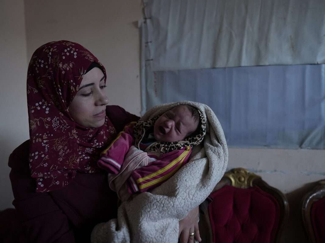 woman with newborn baby in Palestine
