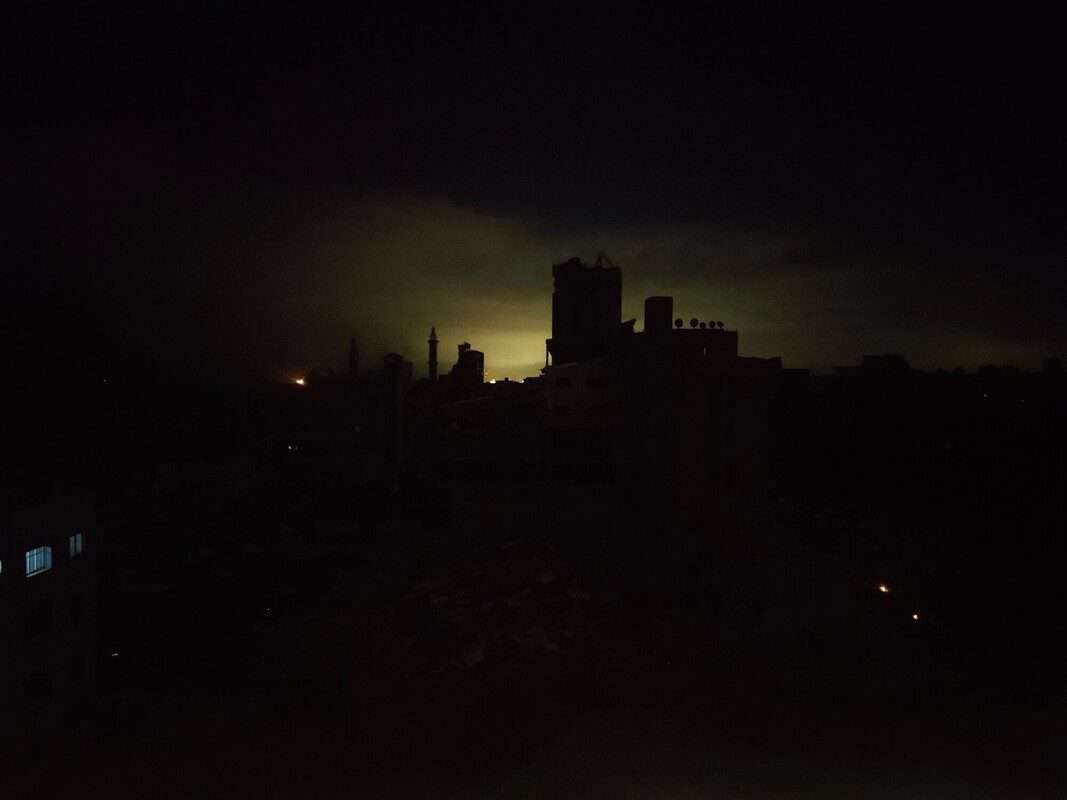 silhouette of destroyed buildings in Gaza