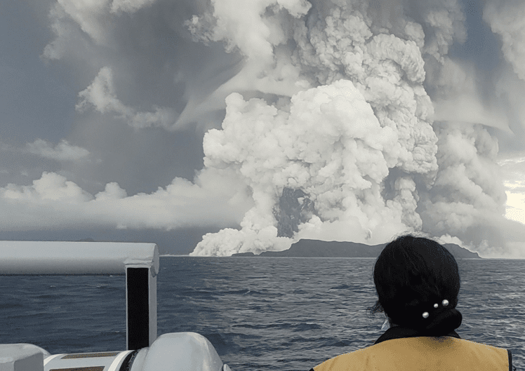 Image of a large volcanic eruption at sea