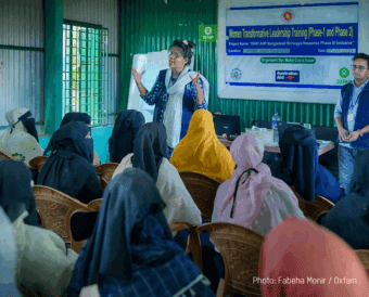 A Woman teaching other woman on leadership in Rohyinga Refugee Camp